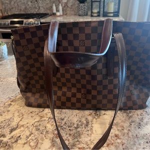 I have used this bag one time. It is clean inside. It is real, can show receipt